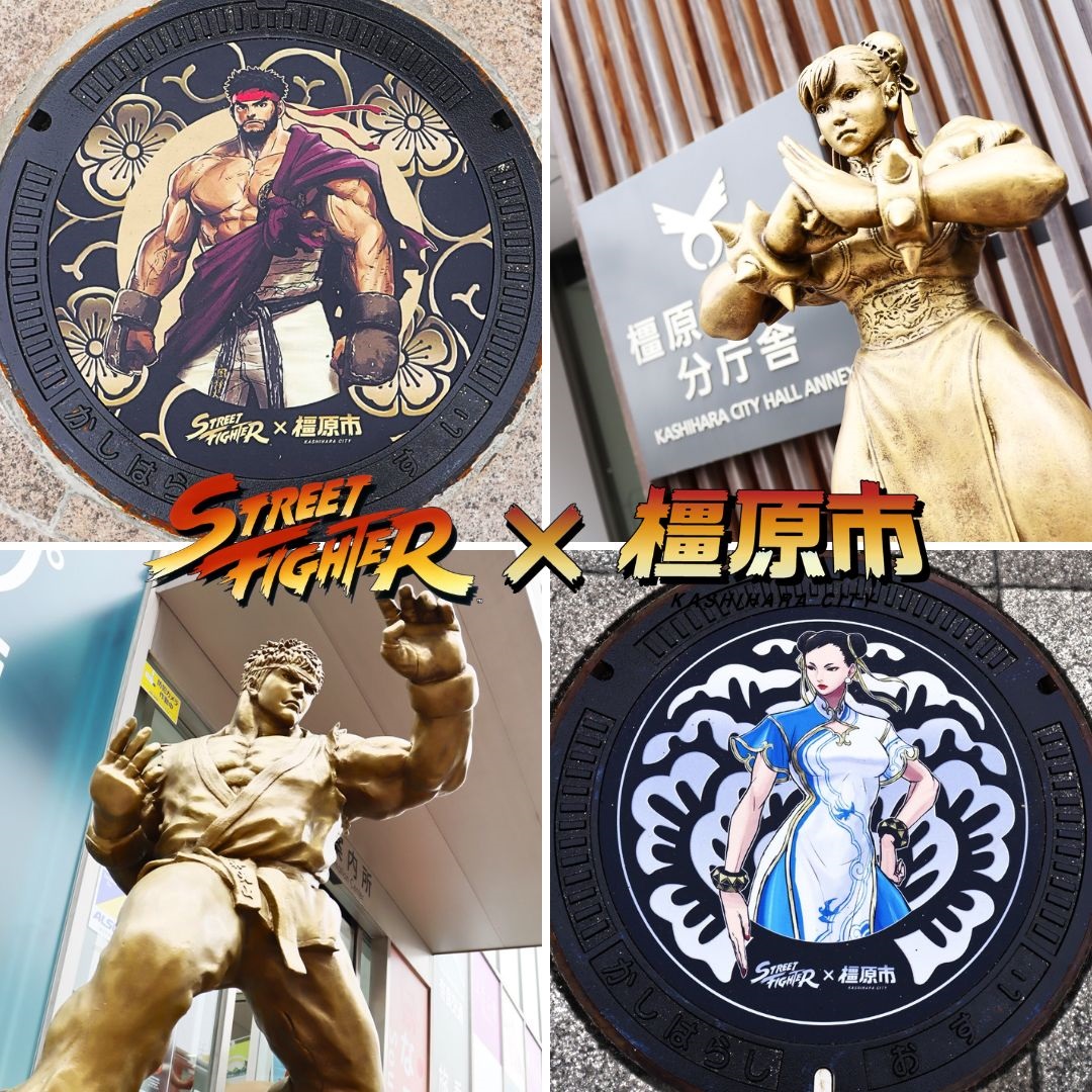 デザインマンホールと銅像の写真