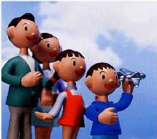 青空を背景に4人の親子の人形が右を向いている写真